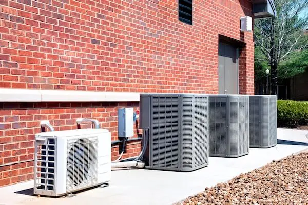 Outdoor HVAC units brick building